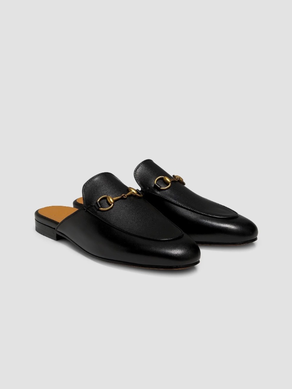 Gucci Princetown Leather Horsebit Mules in black leather with antique gold horse